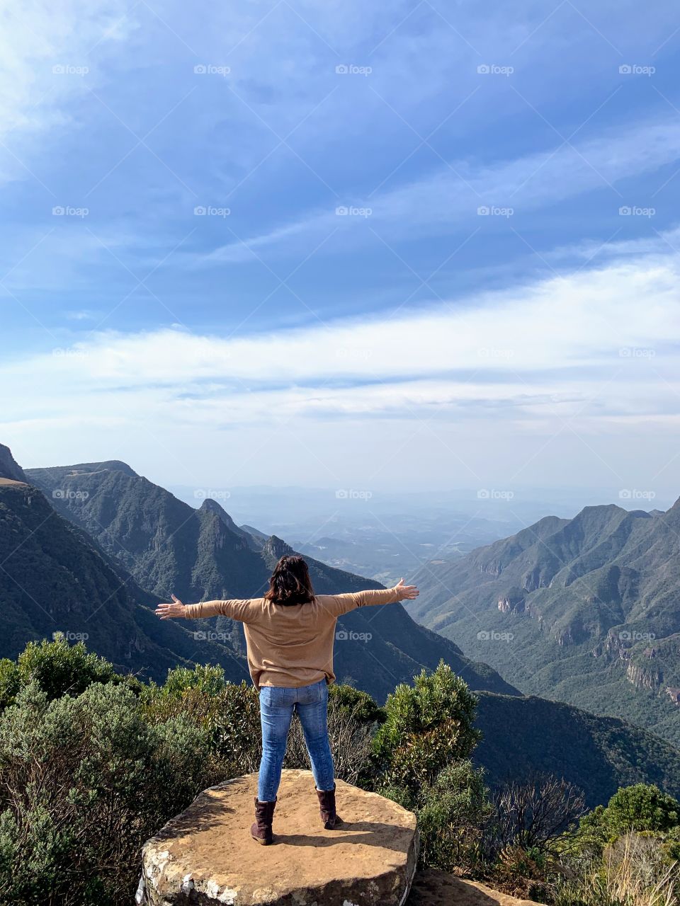 Woman from behind in the canyons of Santa Catarina, Brazil