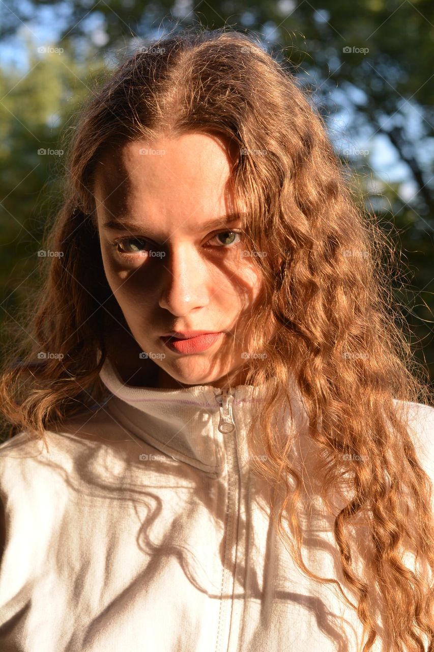 young girl beautiful portrait in sunlight