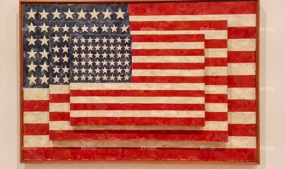 three American flags painted overlaid