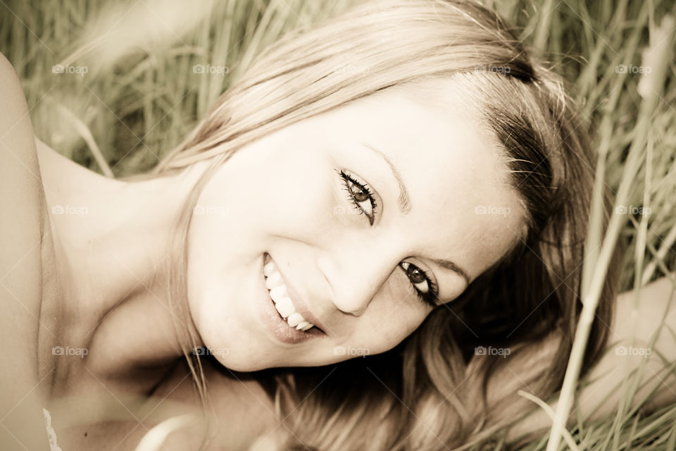 Close-up of a young girl looking at camera