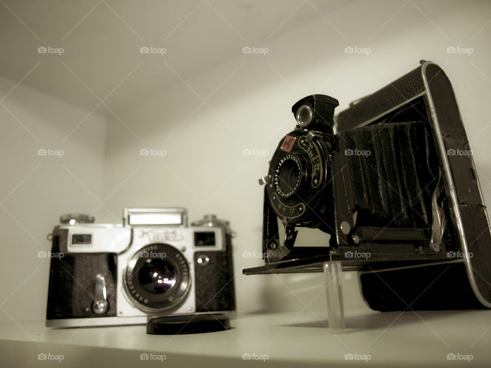 Two old/vintage film cameras, camera evolution