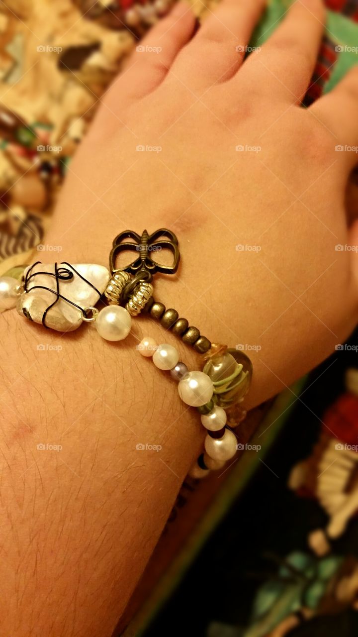 Mother pearl and butterfly beaded bracelets made by me.