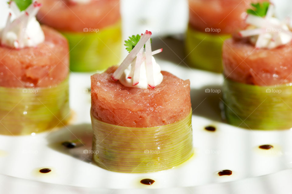 Fresh tuna rolled in bamboo leaf