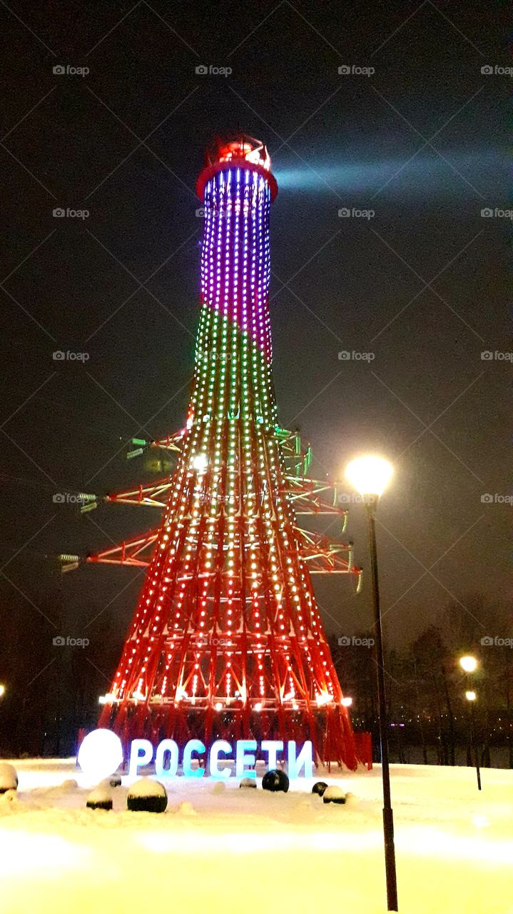 lighthouse in festive lights in the city of Voronezh, Russia
