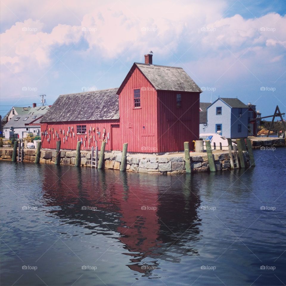 House reflection on sea