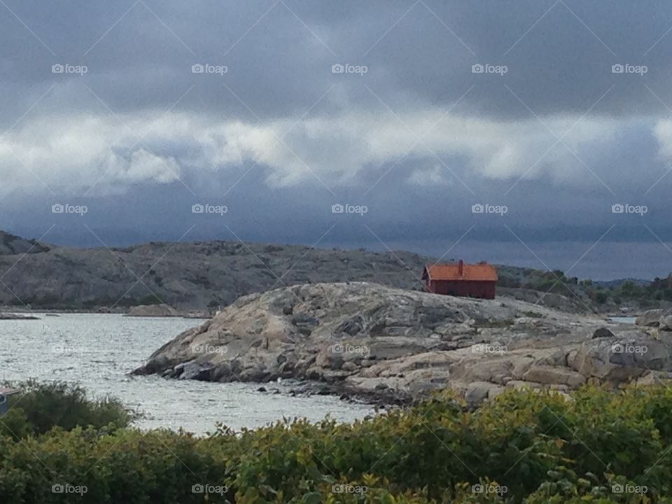 Storm's coming? . Dark cloudy sky at coast