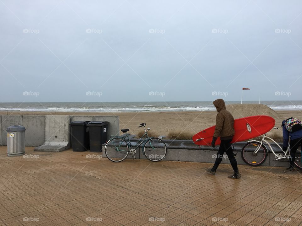 Winter Surfer carrying board