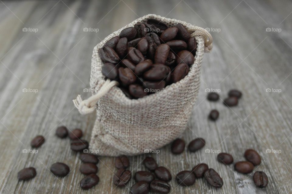Coffee beans in burlap bag 