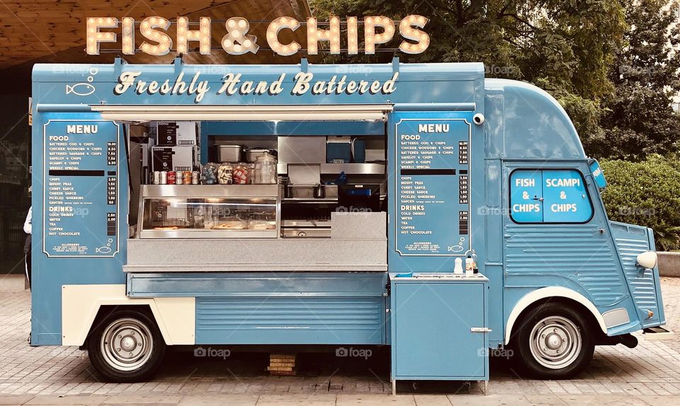 Fish and Chips blue food truck parked in London, freshly hand buttered fish and chips, small businesses, food in London, London street food