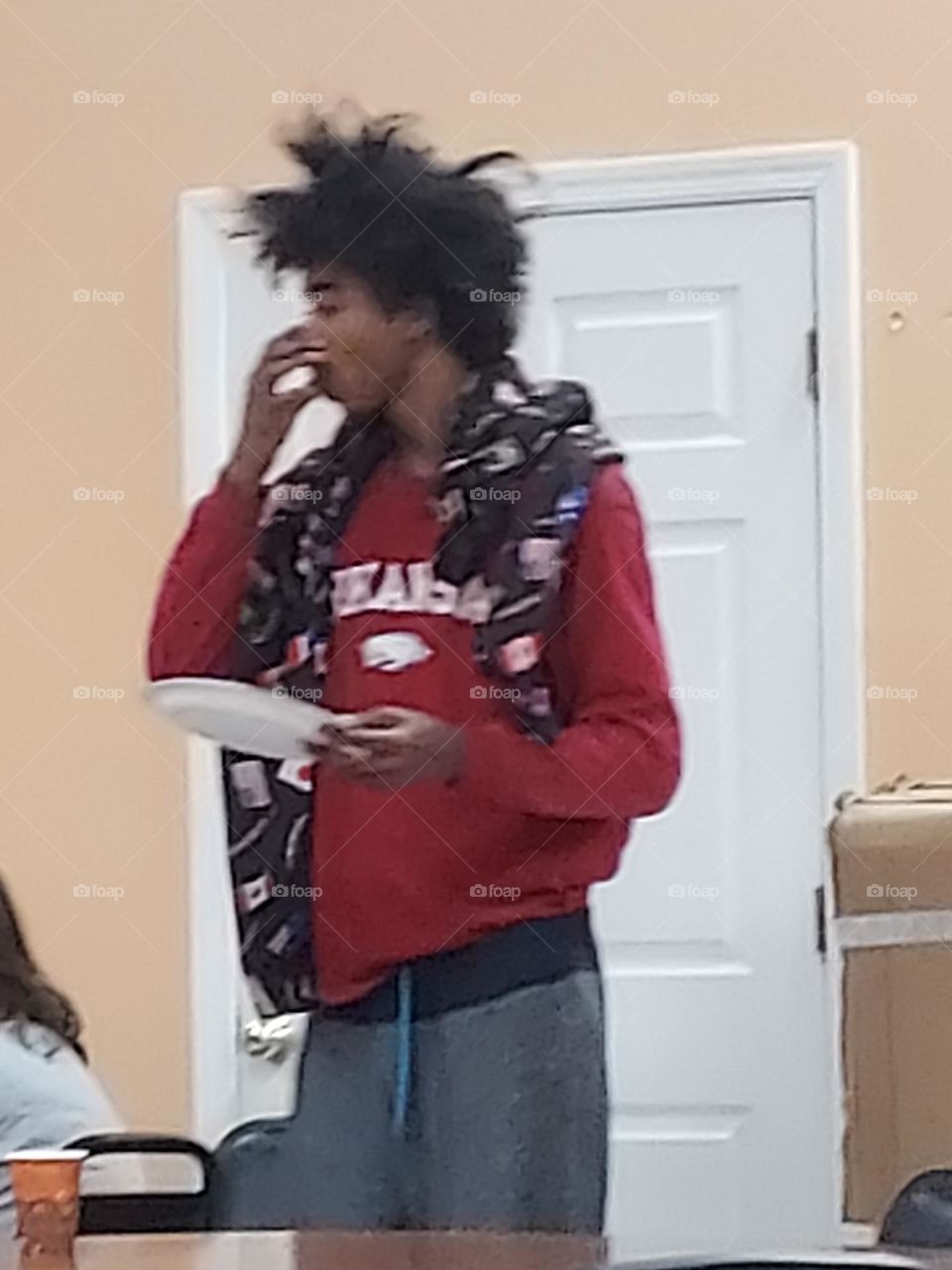 homeless enjoying a free meal of ham greenbeans potato casserole and roll. Sunday