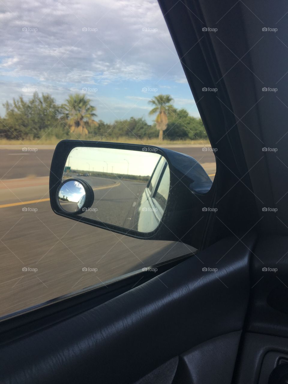 Clouds on Wing mirror 