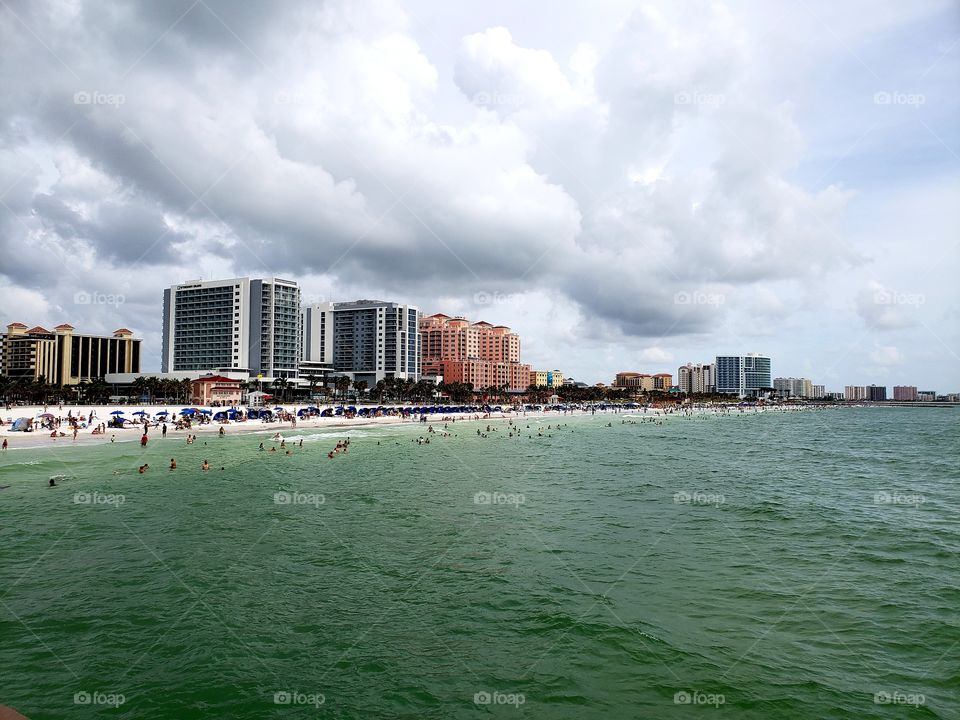 Clearwater Beach from Pier 60. Storm clouds overhead created a dramatic effect. The Gulf waters had a little chop to it.