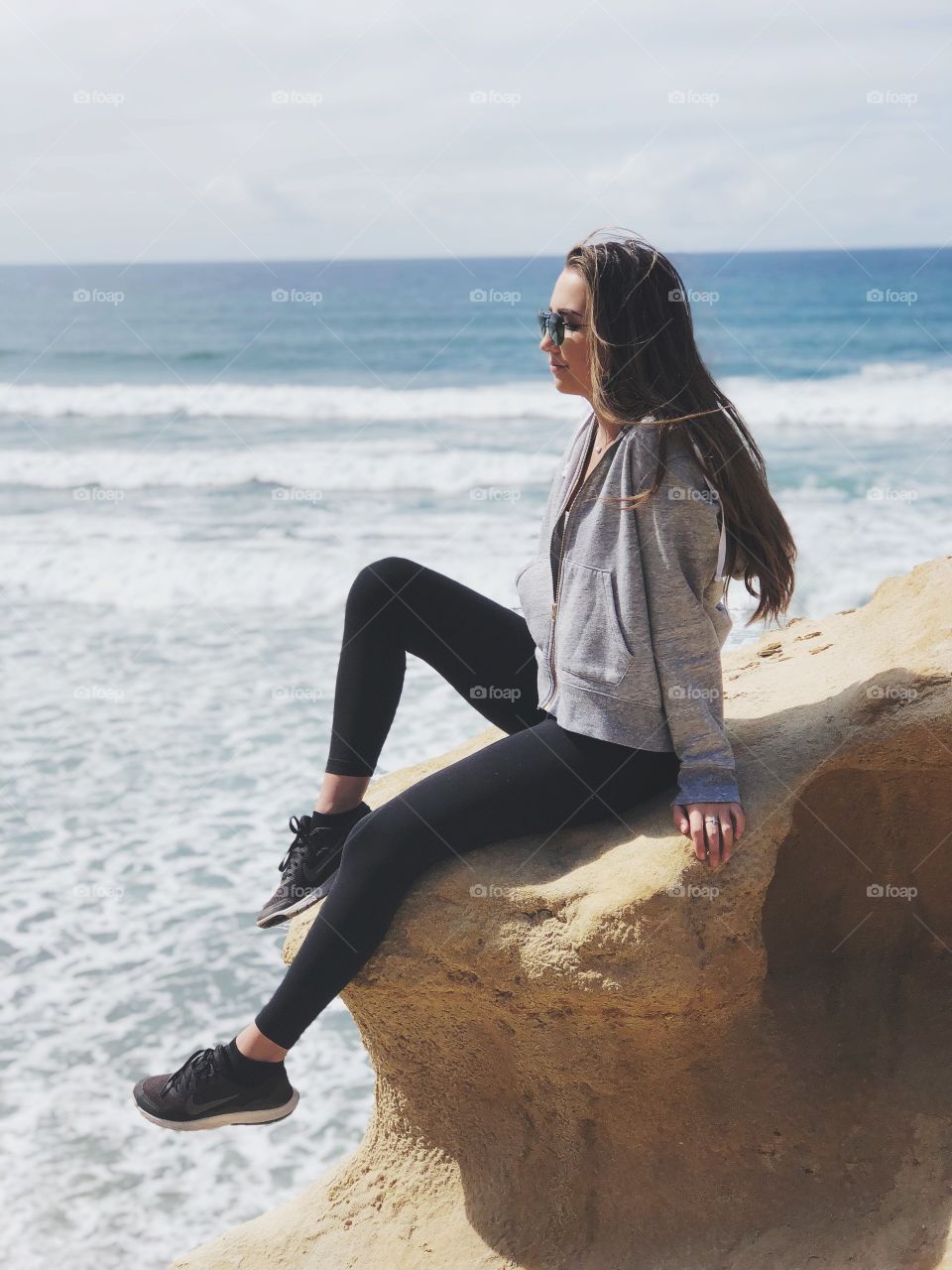 Young active girl enjoying a hike by the beach in Southern California.