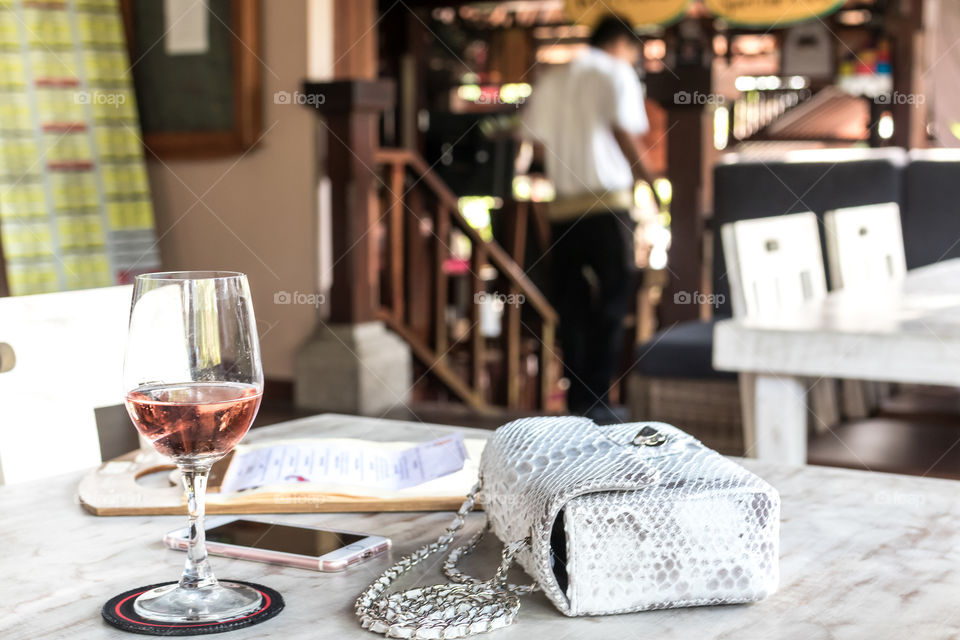 White python bag on the table