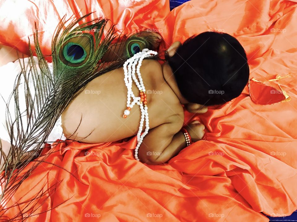 Little Krishna getup.its a tradition of Hindus . All women would like to do a Krishna getup for their children on krishnastami festival.