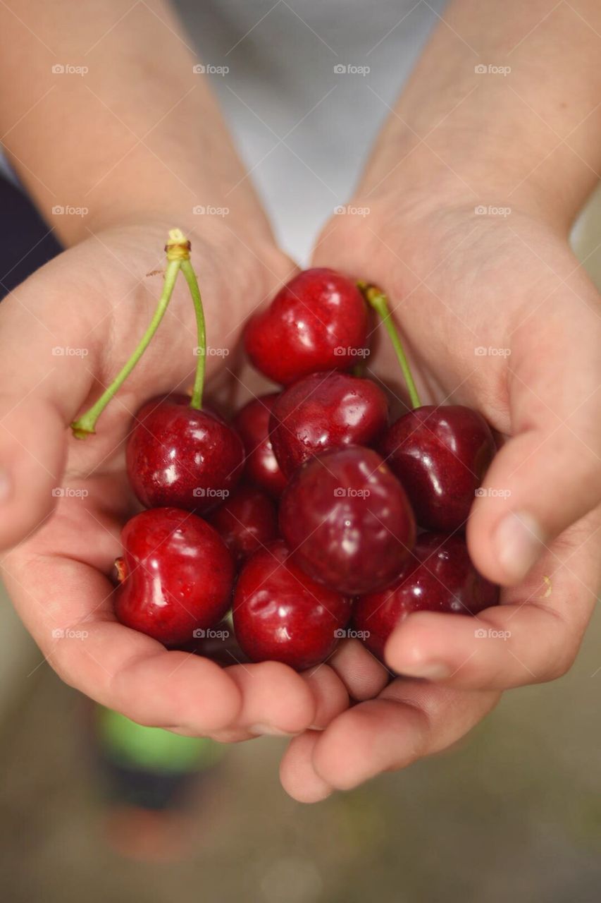 Cherry in hand