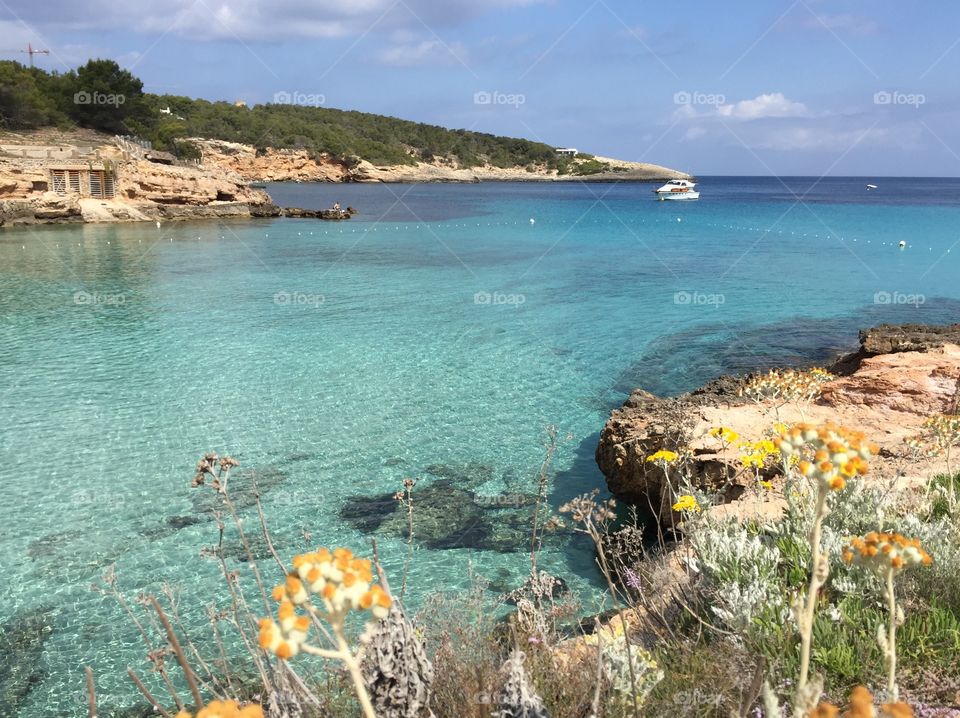 Crystal blue sea and cliffs