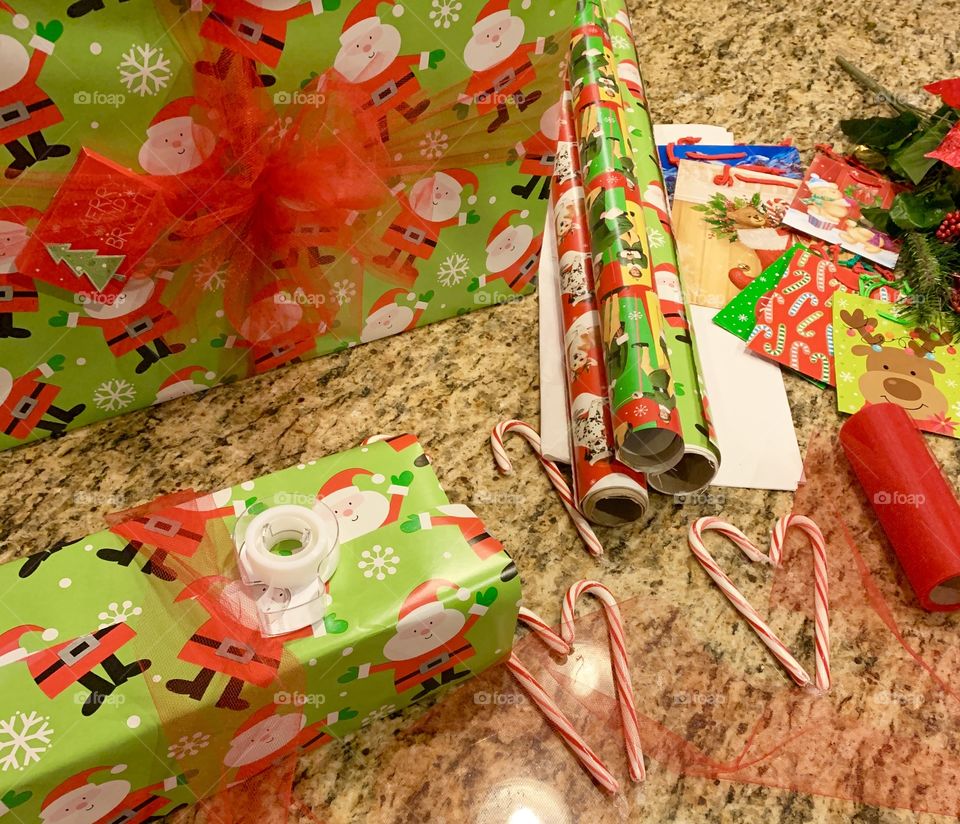 Christmas wrapping, candy canes and Christmas music getting ready for Santa!