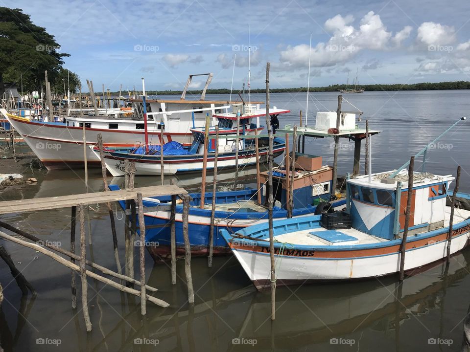 fishing boats moored at the port of Caravelas, Bahia