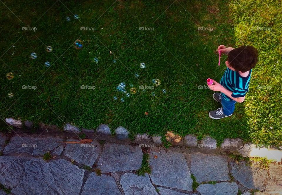 Blowing bubbles in the garden 