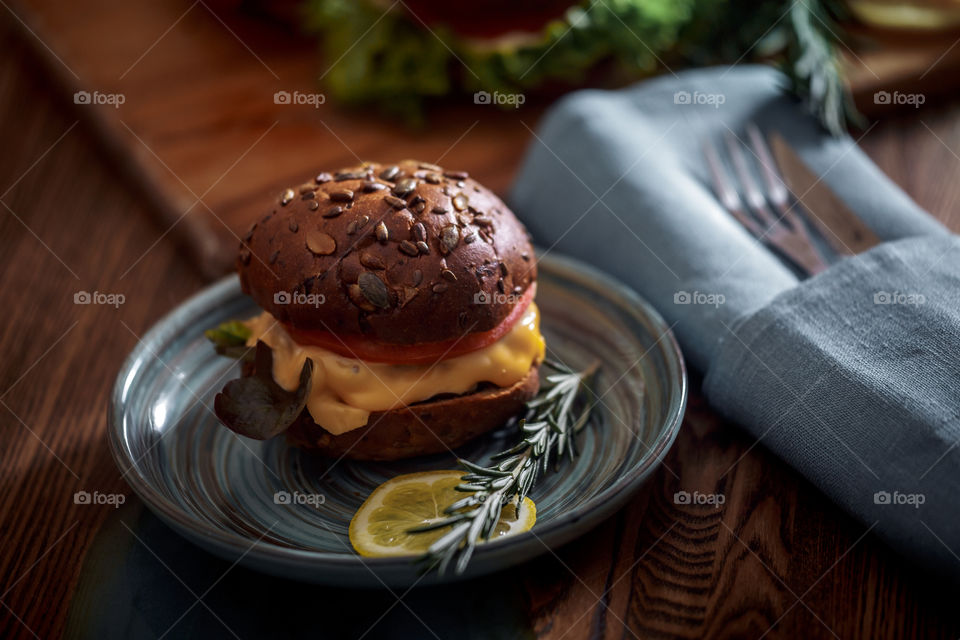 Dark burger with grain bread