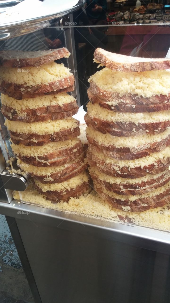 Cheesy sandwiches ready to be grilled for gooey goodness in Greenwich, London, England