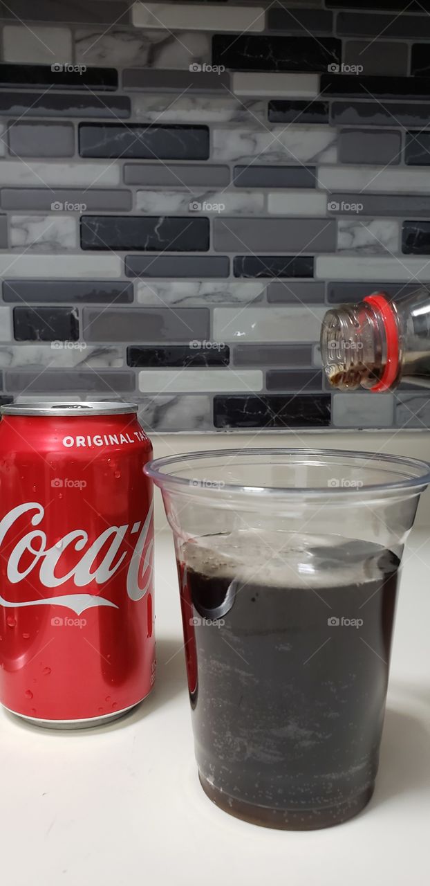 Coca Cola in cup