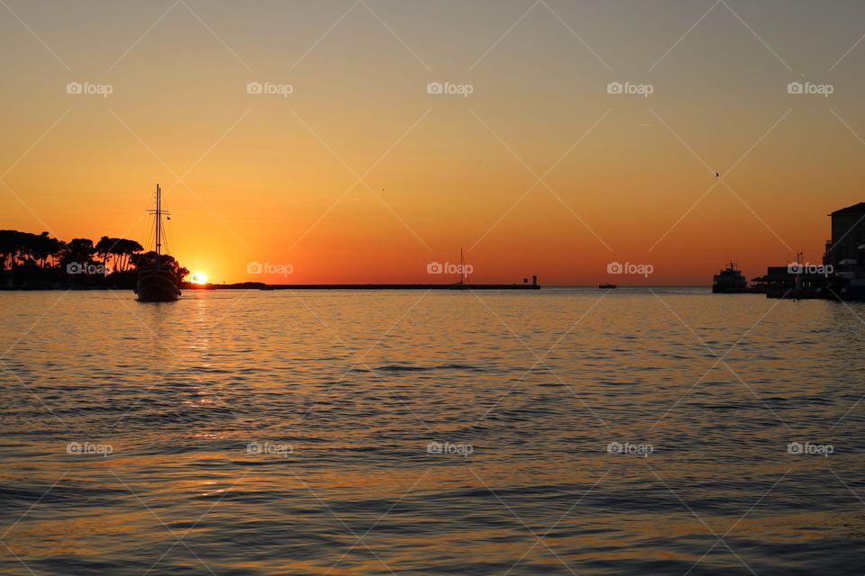 Sonnenuntergang in Poreč, Istrien, Kroatien