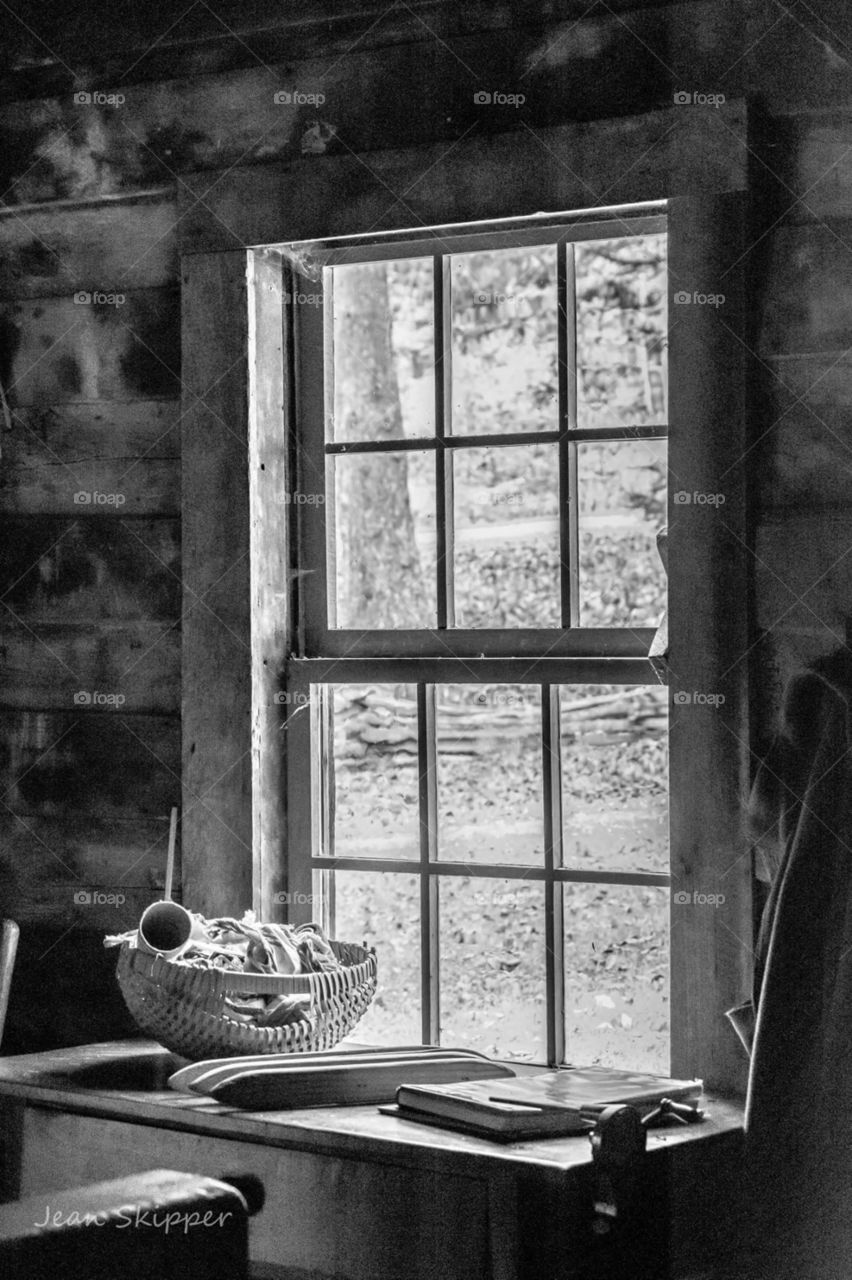 Window in old log cabin