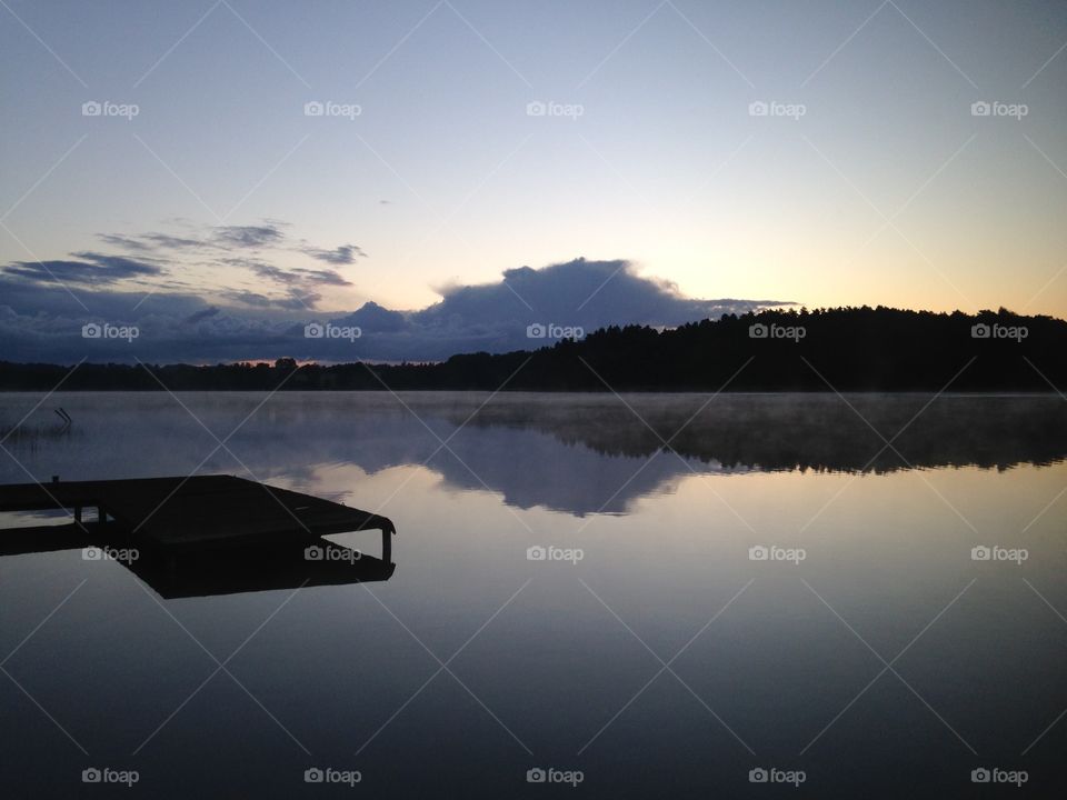 Early summer sunrise at the lakeside in Poland 