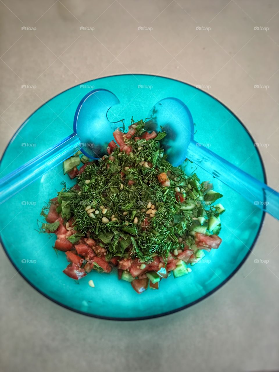Fresh seasonal salad with vegetables and pine nut
