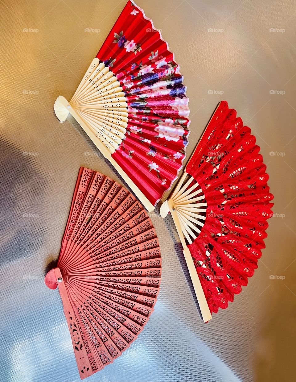 Hand fans, pretty little objects to keep you cool. The fan originated about 400 years ago in Egypt. The fan became especially popular in Spain, where flamenco dancers used the fan and extended its use to the nobility.