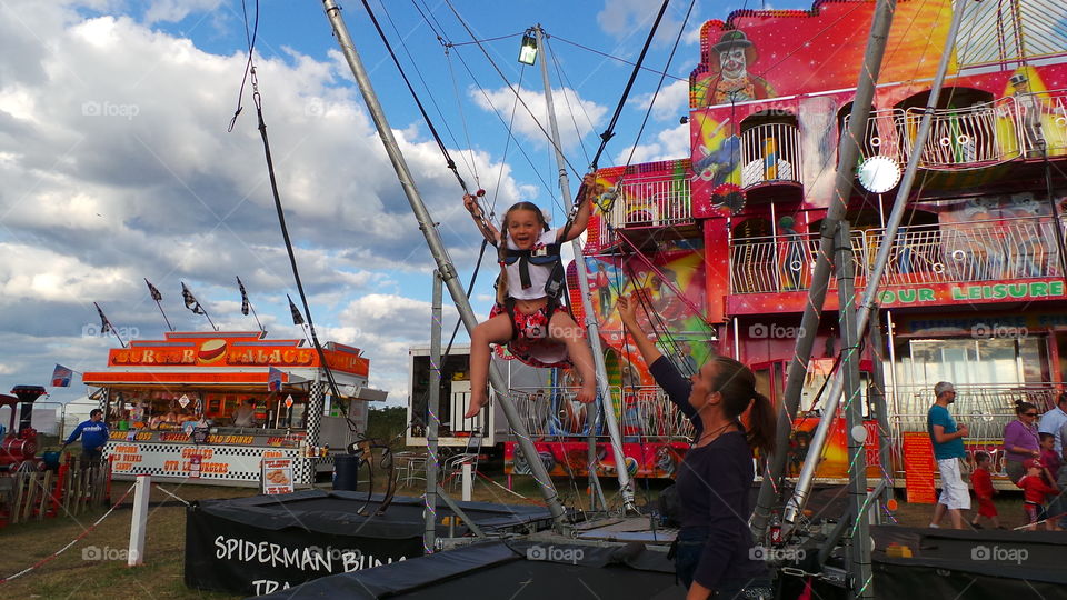 fairground with huge trampolines.