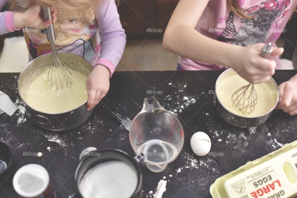 Girls making pancake breakfast 