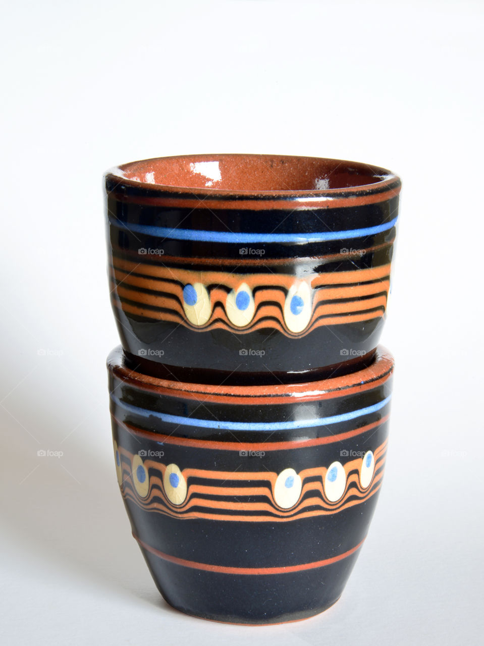 Cups against white background