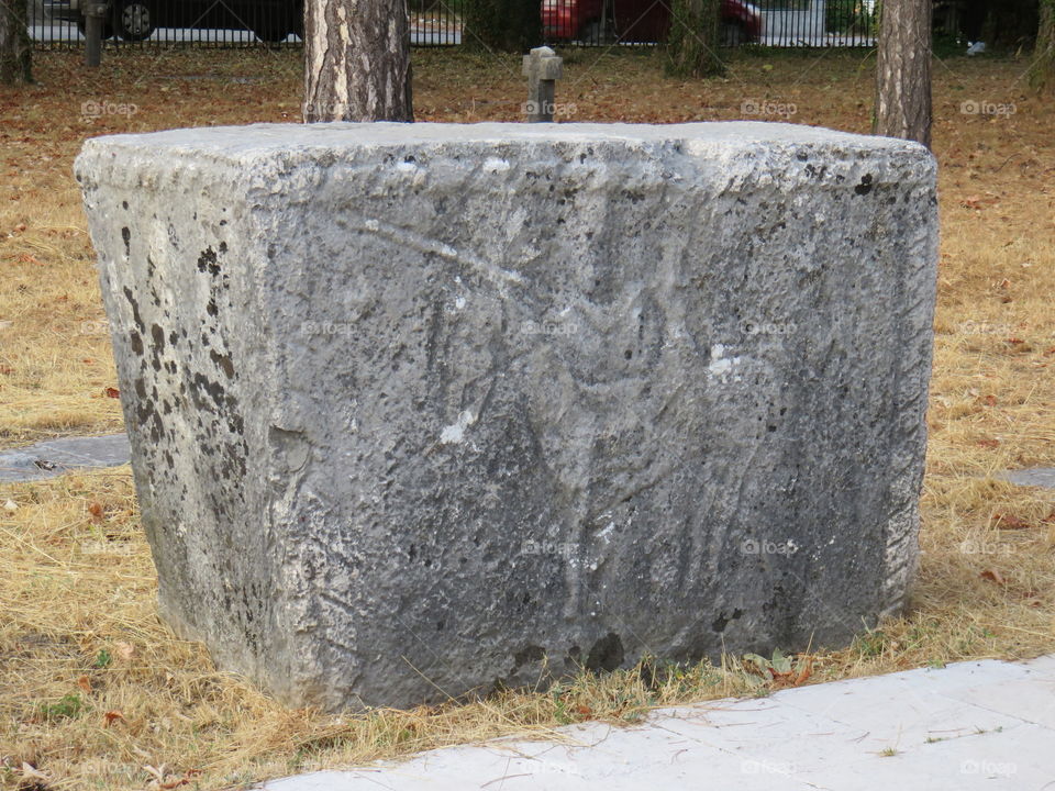 medieval stone slab carved horseman