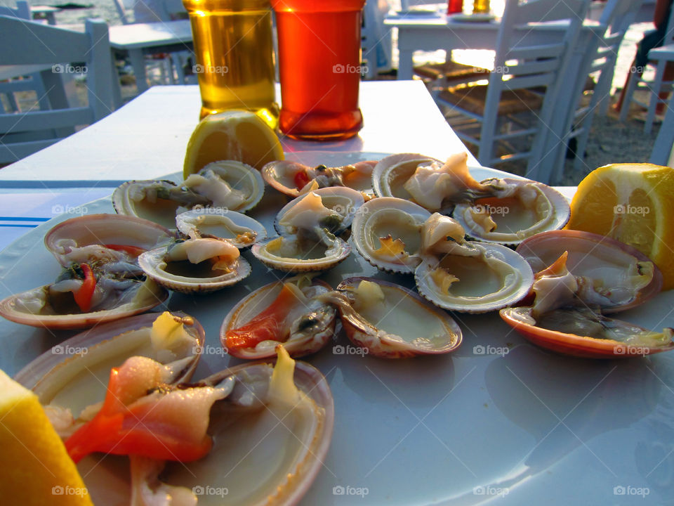 Seashells to eat. Raw seashells greek islands tavern