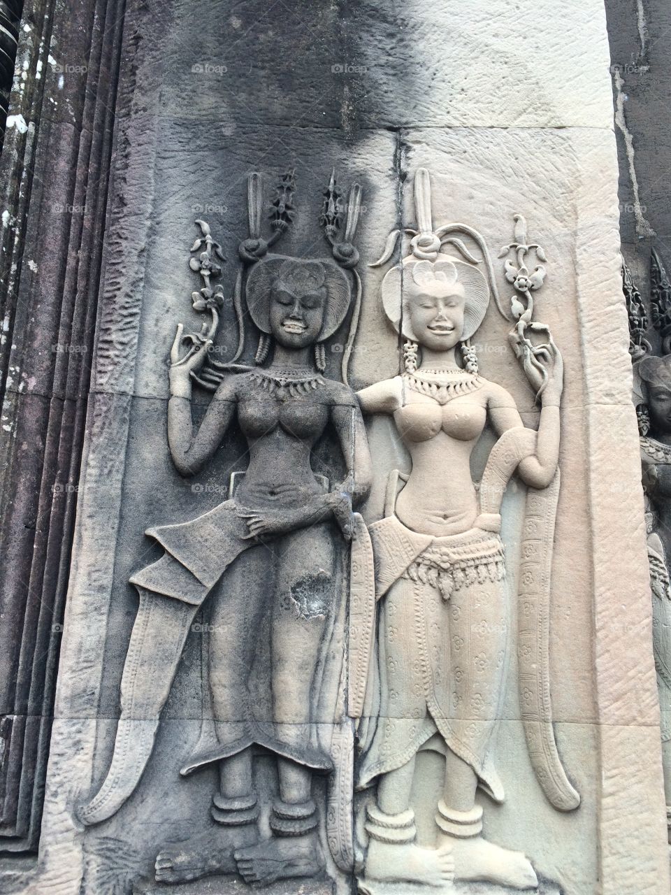 Siem Reap, Cambodia (Angkor Wat temple): nude sculptures of Eastern Asia culture 