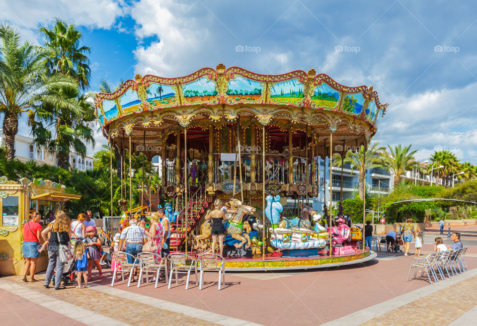 Roundabout.   Children's merry- go- round