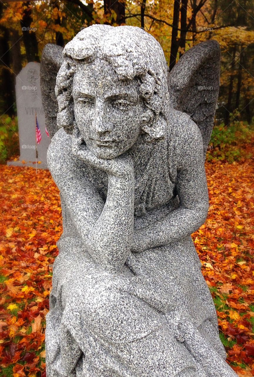 Bored angel . Love the expression on this angel 
