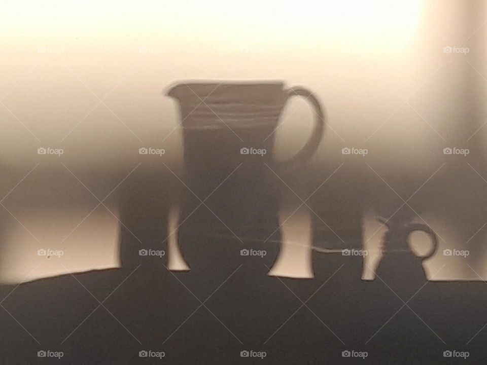 Shadows of Glass Jug and Glasses