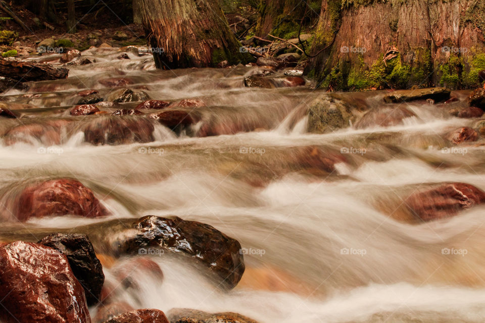 Flowing water fall over rocks