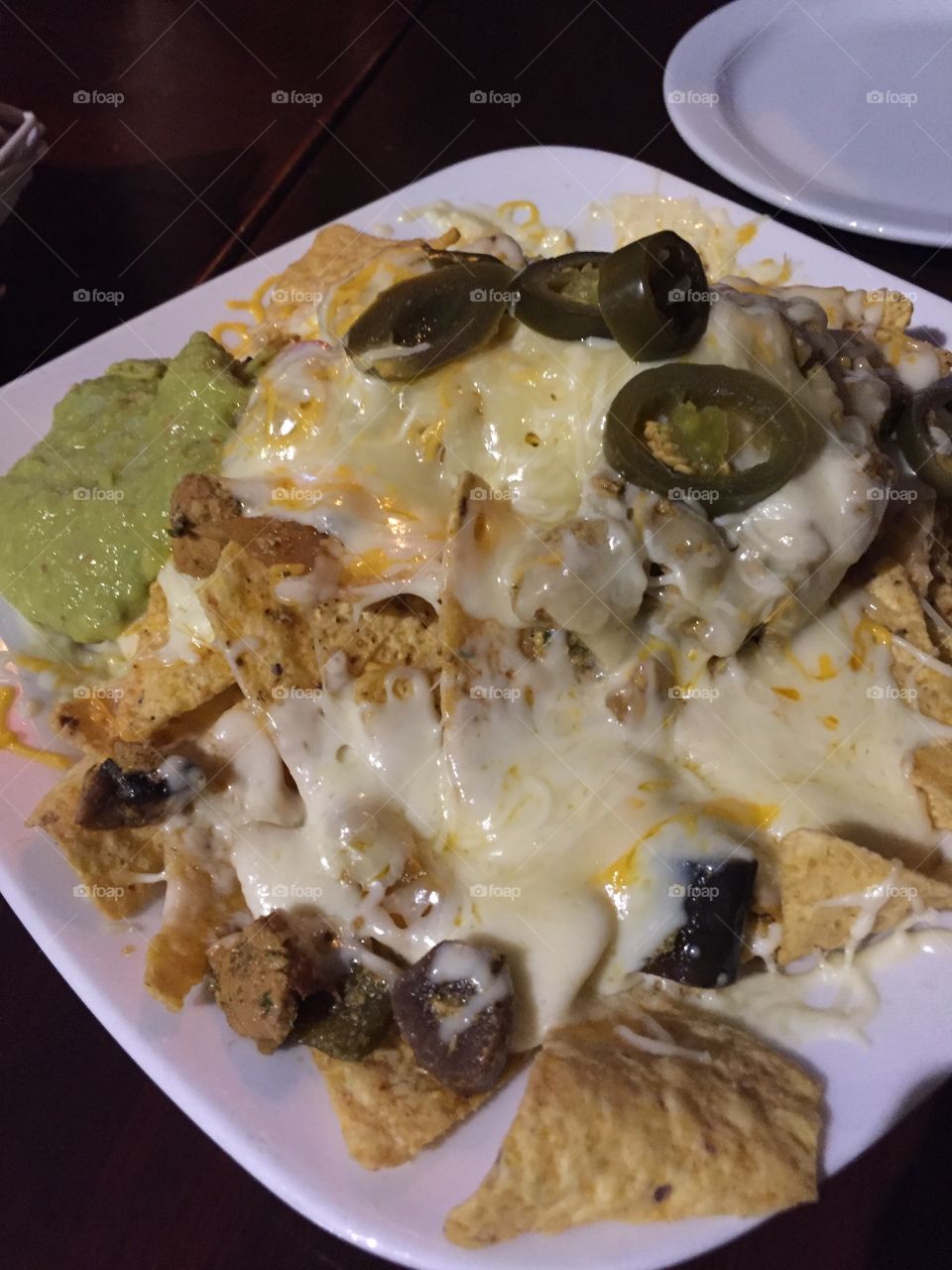 Nachos with Cheese and hot Jalapeños