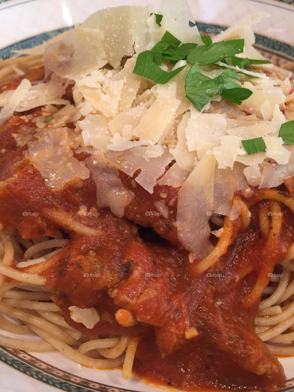 Ancient Grain Pasta.  Spaghetti. Cheese. Parsley. Tomato Sauce. Italian Food. Delicious Dinner. Cooking. 
