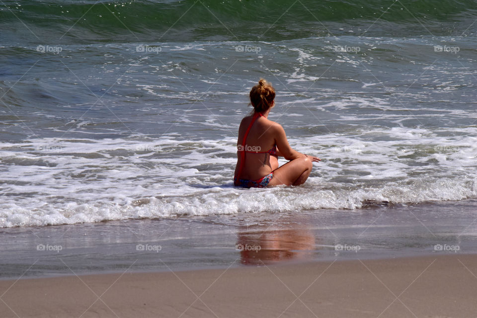 Sitting in the ocean 