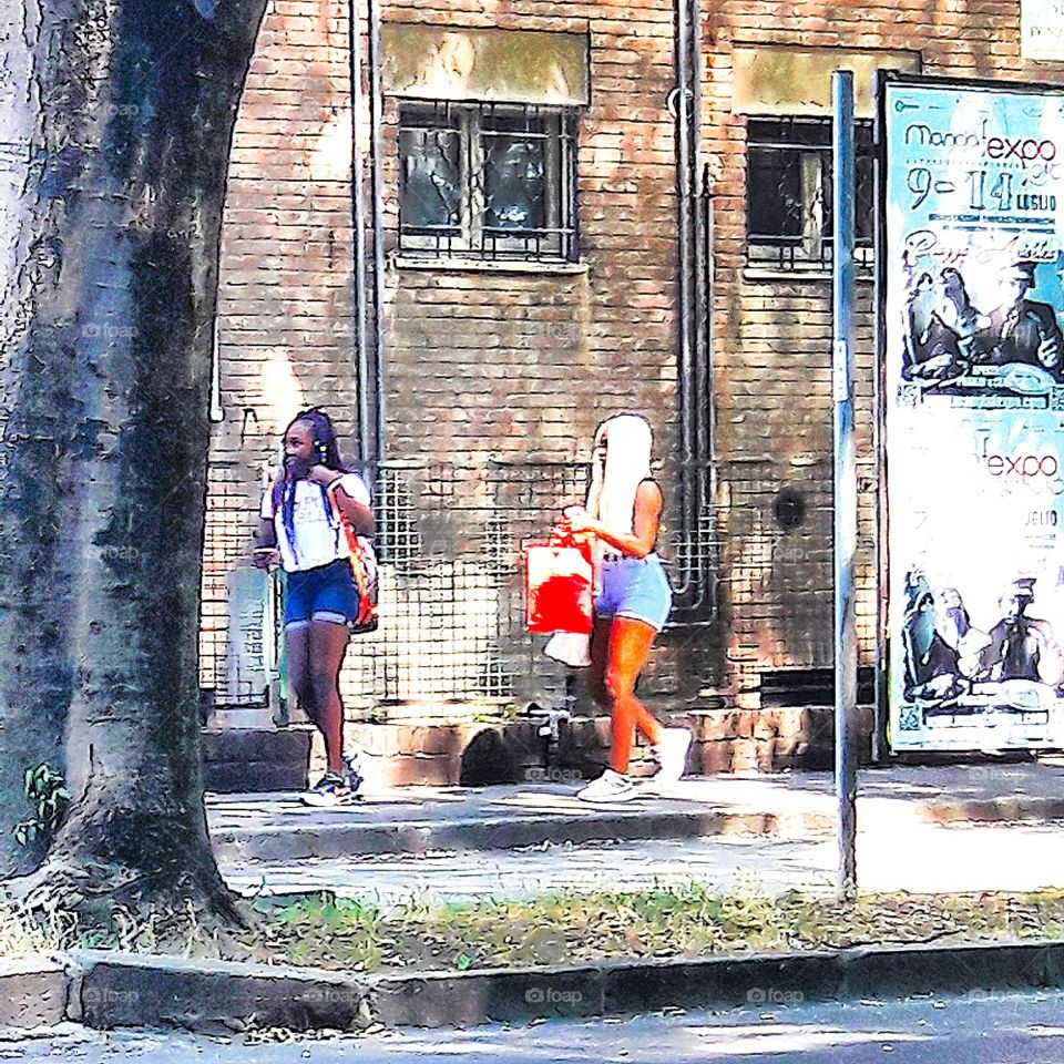 two woman near the railstation