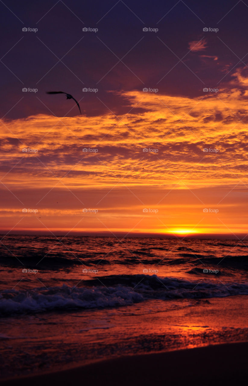 Sunrise over calm Sea