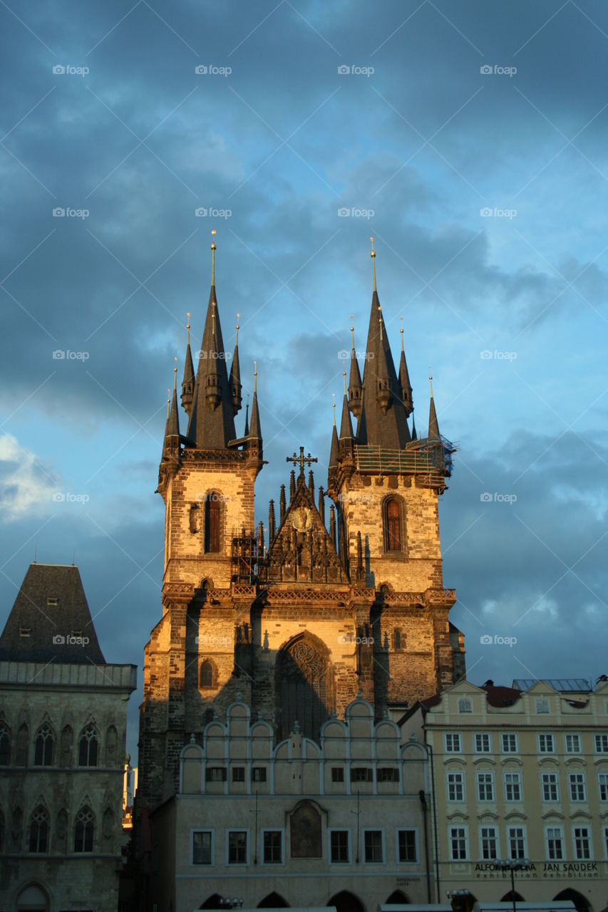 The golden hour captured at the Tyn church in Prague city centre.