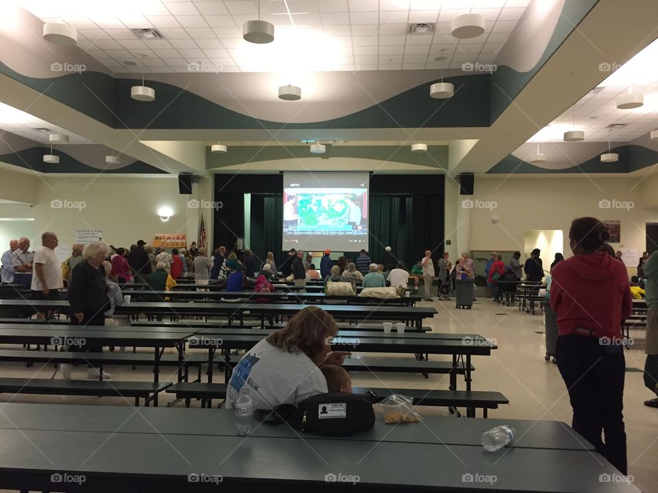 With mandatory evacuations in Flagler Beach, Florida during hurricane Matthew, residents stayed at the Bunnell elementary school. The cafeteria shown here served over 700 meals three times a day.