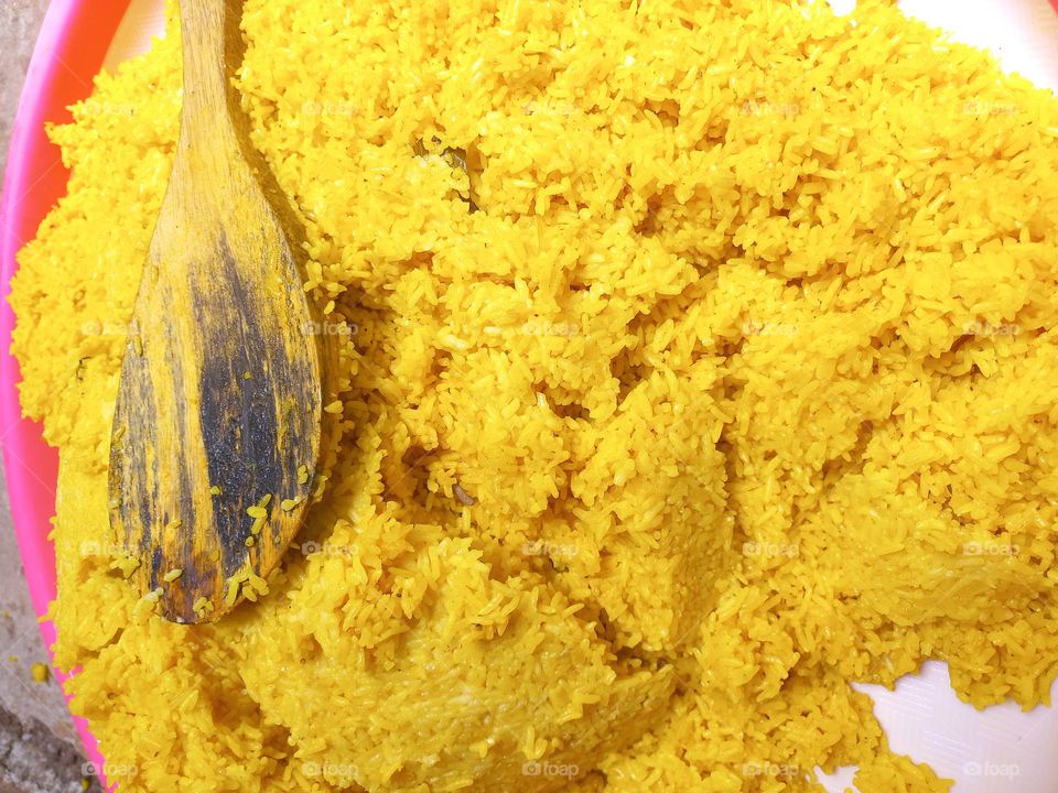 This dish is made from rice cooked together with turmeric and coconut milk and spices